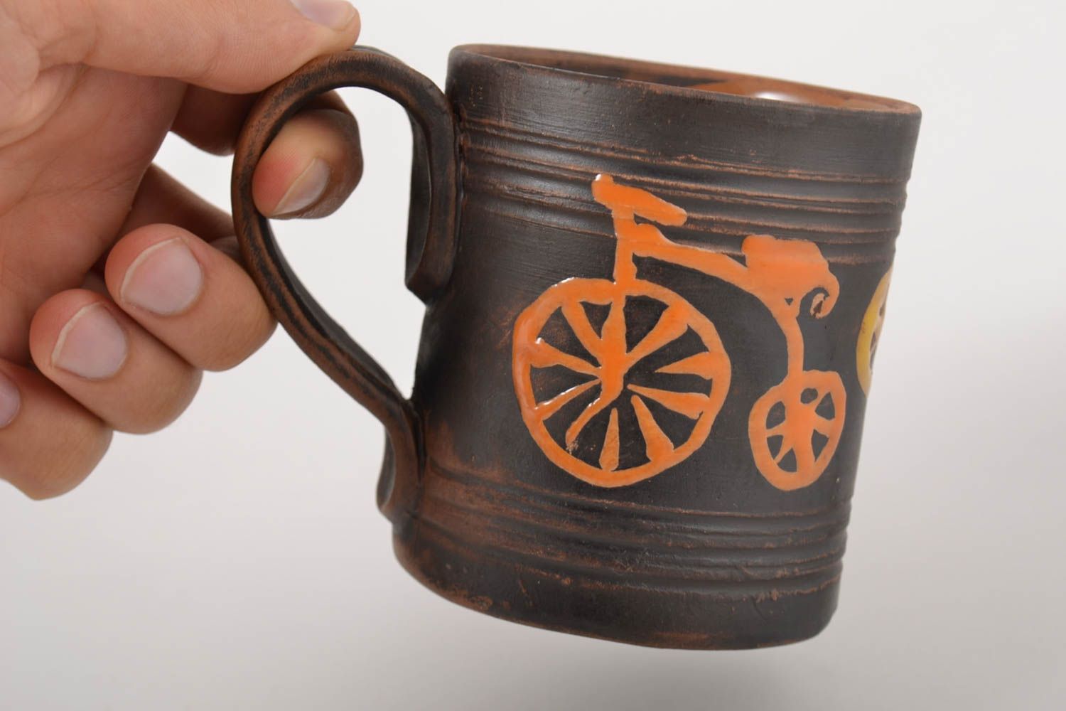 Handmade ceramic 8 oz coffee mug in dark brown and beige color with handle and bicycle pattern photo 2