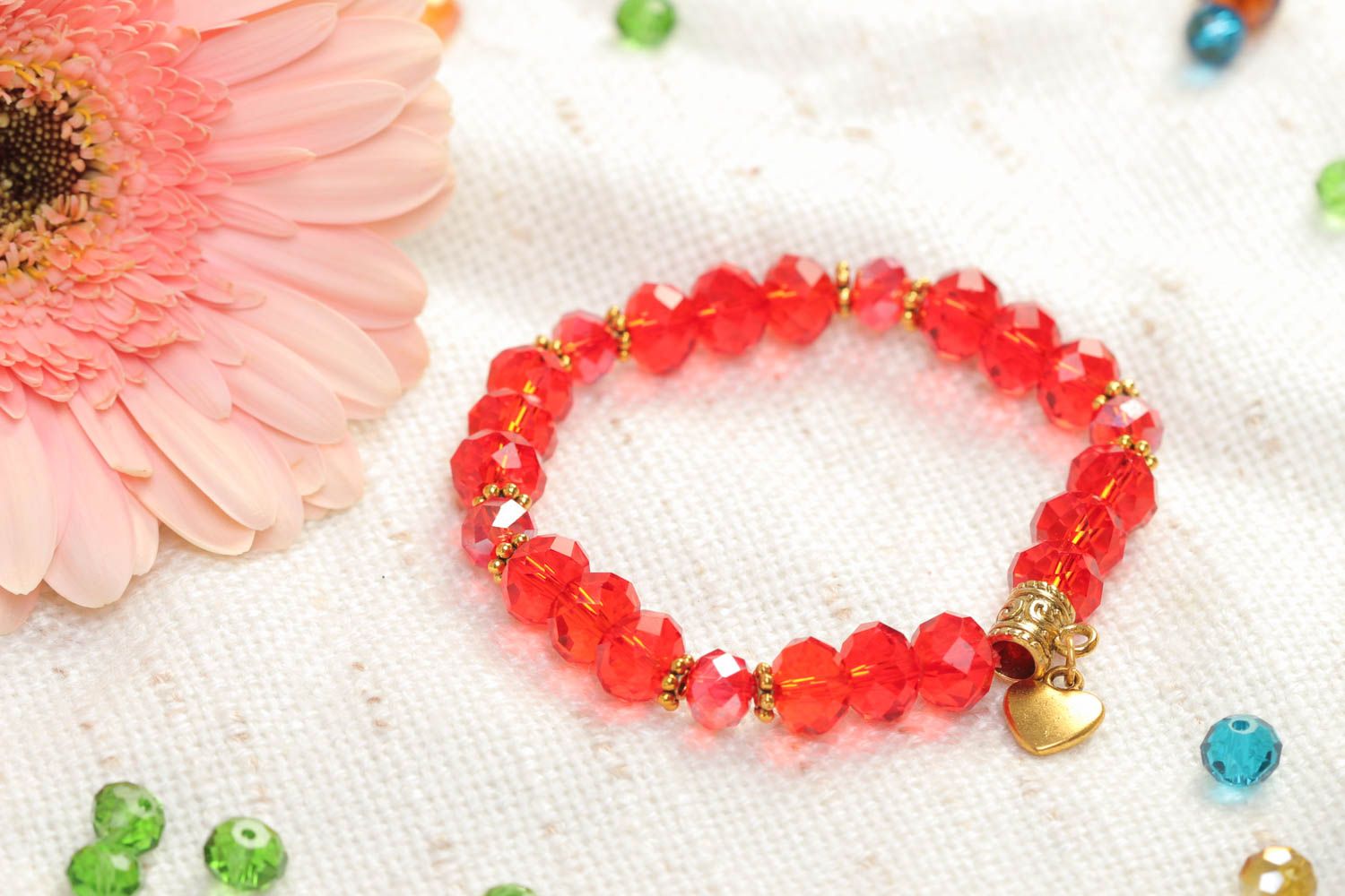 Handmade crystal beaded bracelet in red color with heart centerpiece photo 1