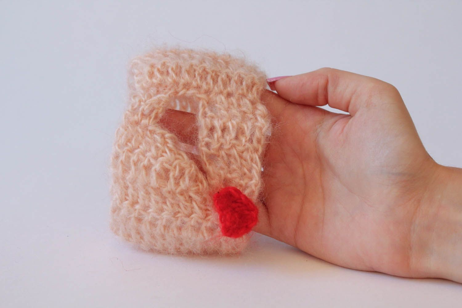 Knitted cup cozy with a heart photo 3