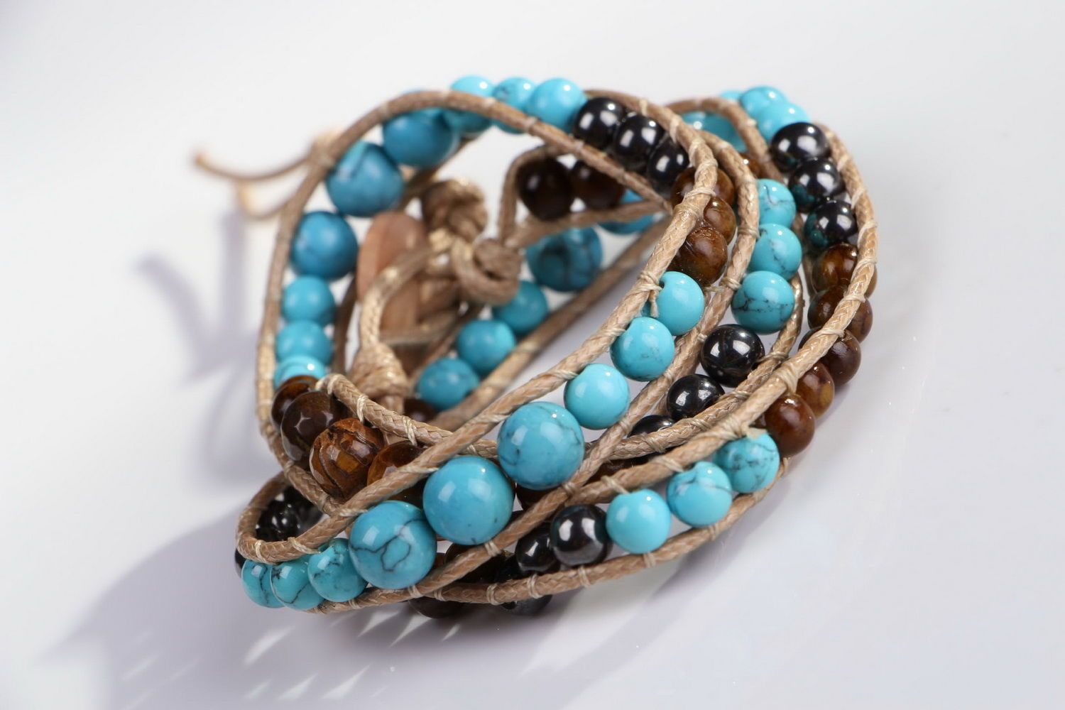 Bracelet made of tiger's eye stone, hematite and turquoise photo 3