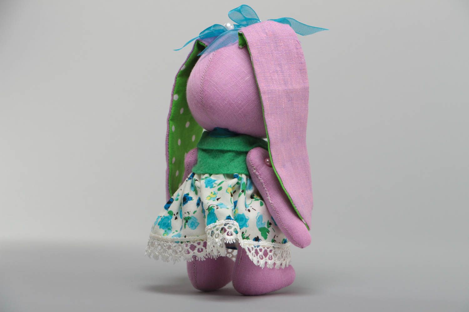 Handmade decorative soft toy in the form of pink bunny pink with green ears photo 4