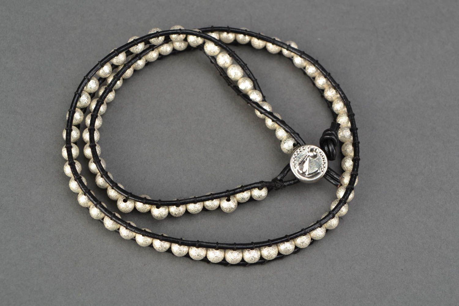 Multirow woven bracelet with metal beads photo 3