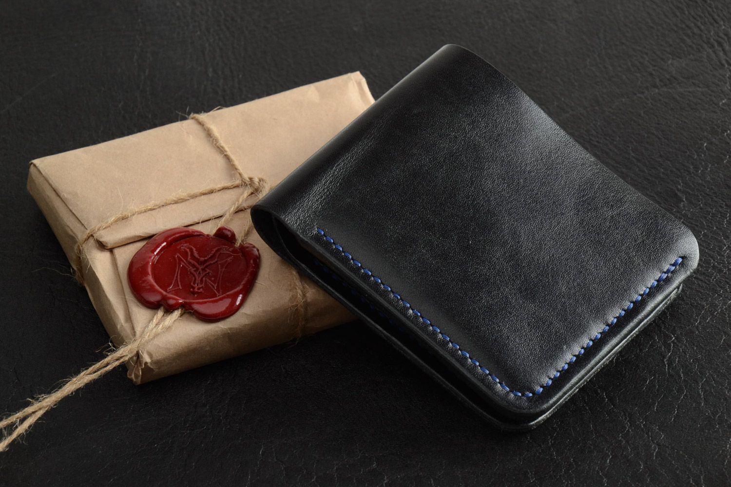 Homemade genuine leather wallet of black color with three departments for men photo 1