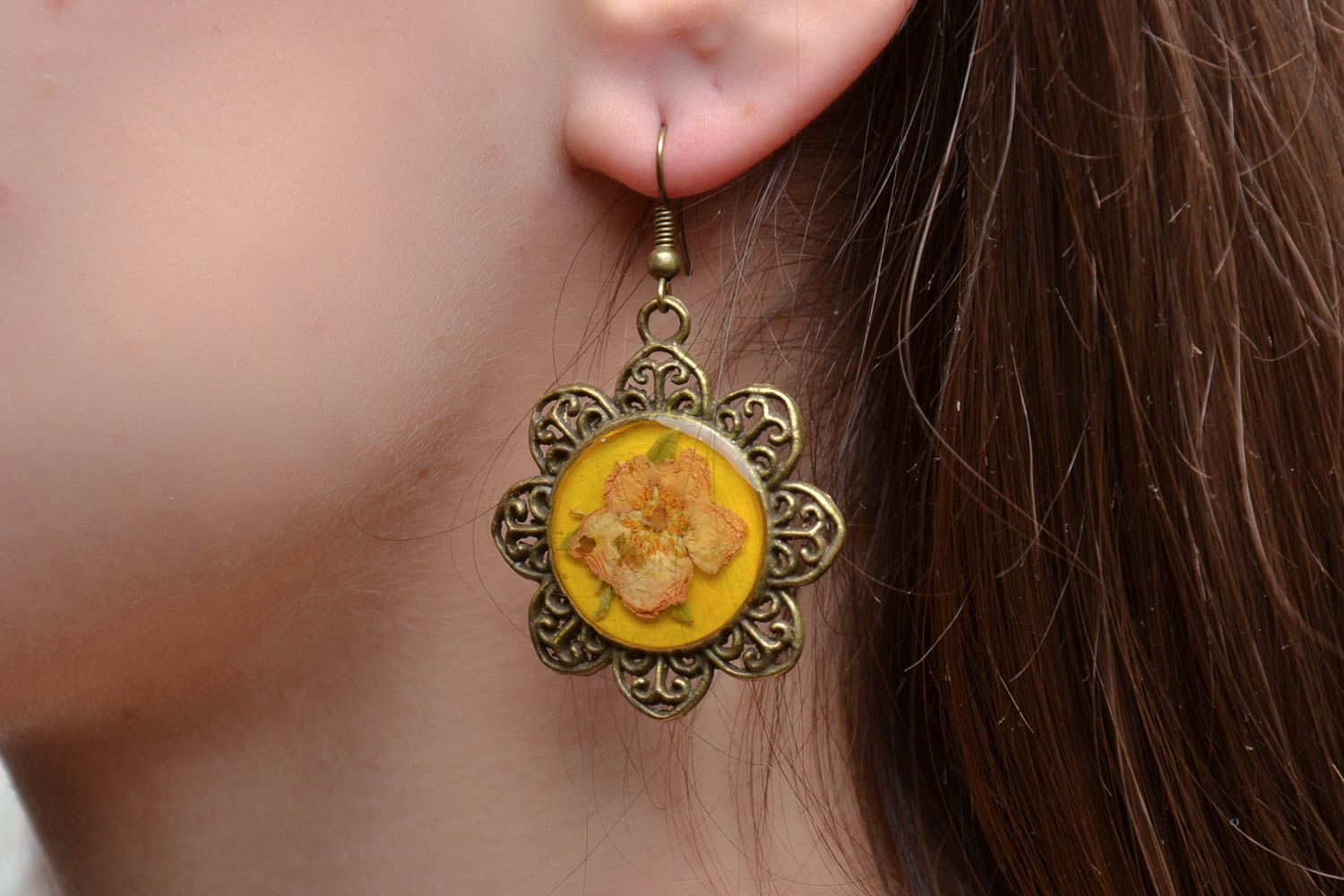 Unusual earrings with natural flowers in epoxy resin photo 2