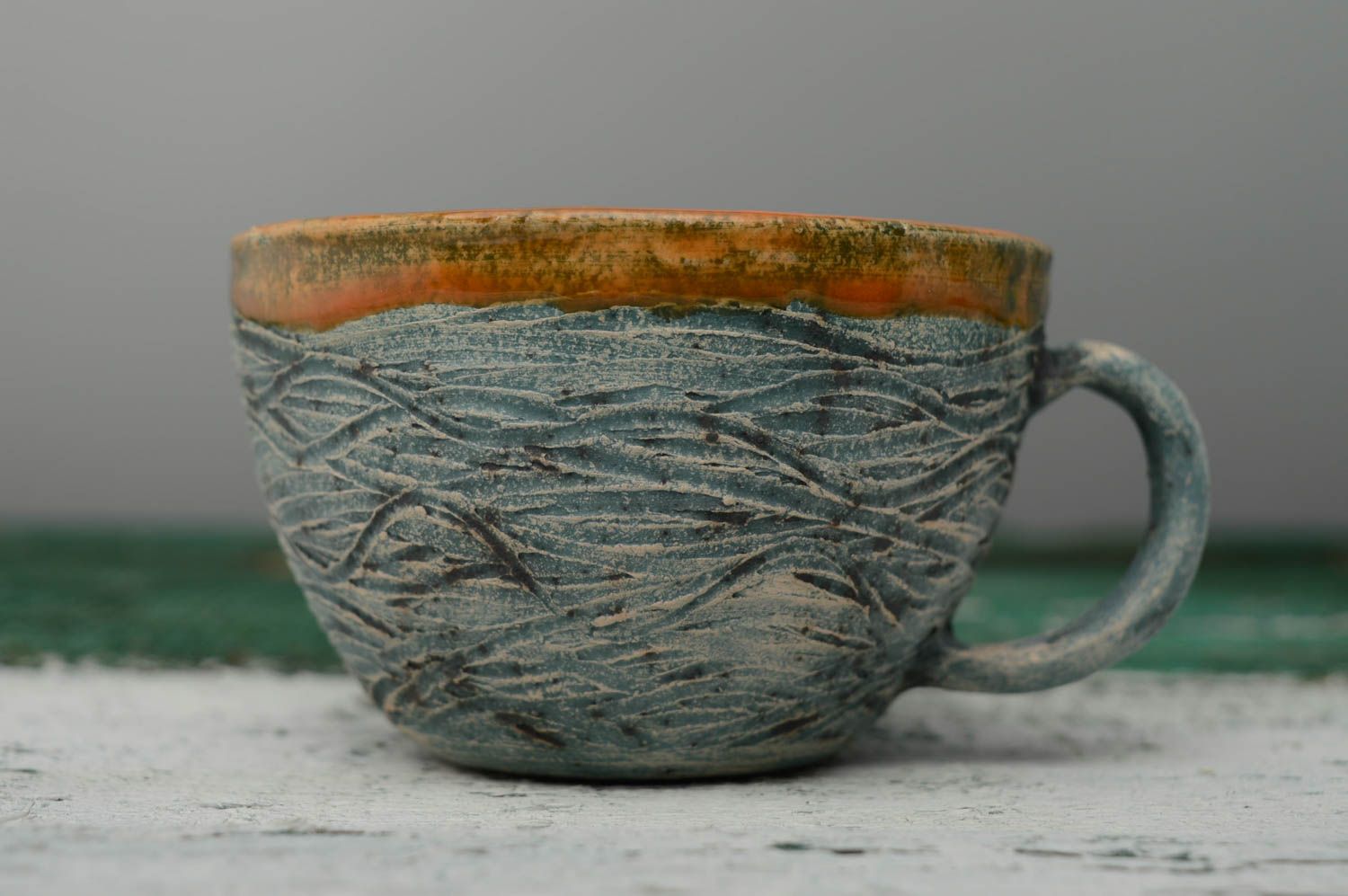 Glazed inside clay handmade drinking cup for coffee or tea photo 2