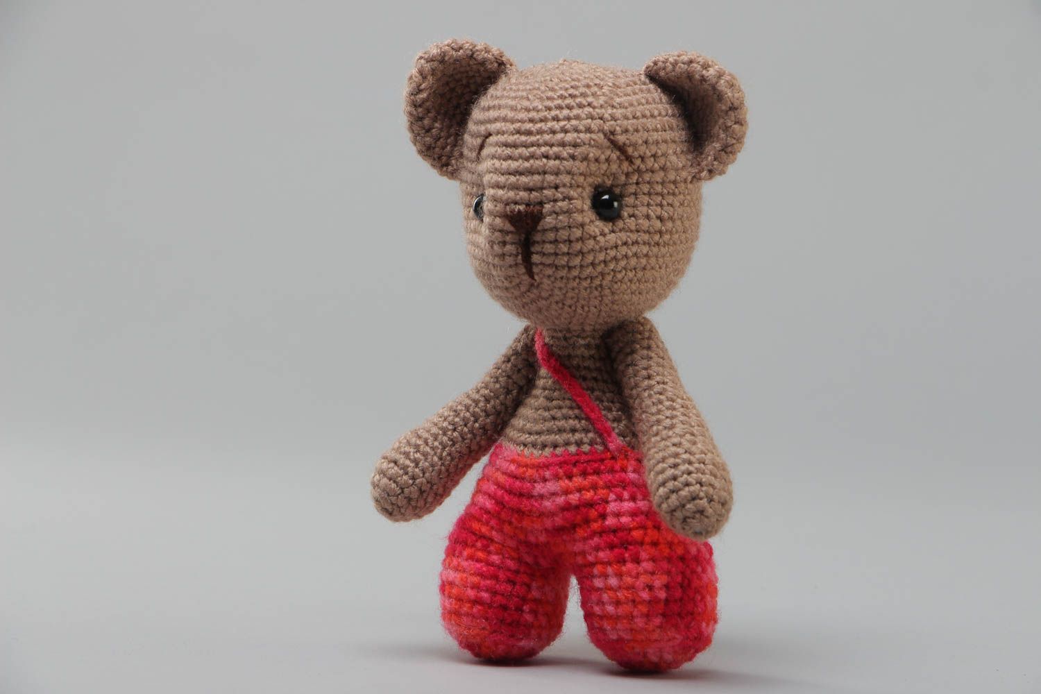Small handcrafted soft crocheted teddybear for children made using knitting needle photo 2