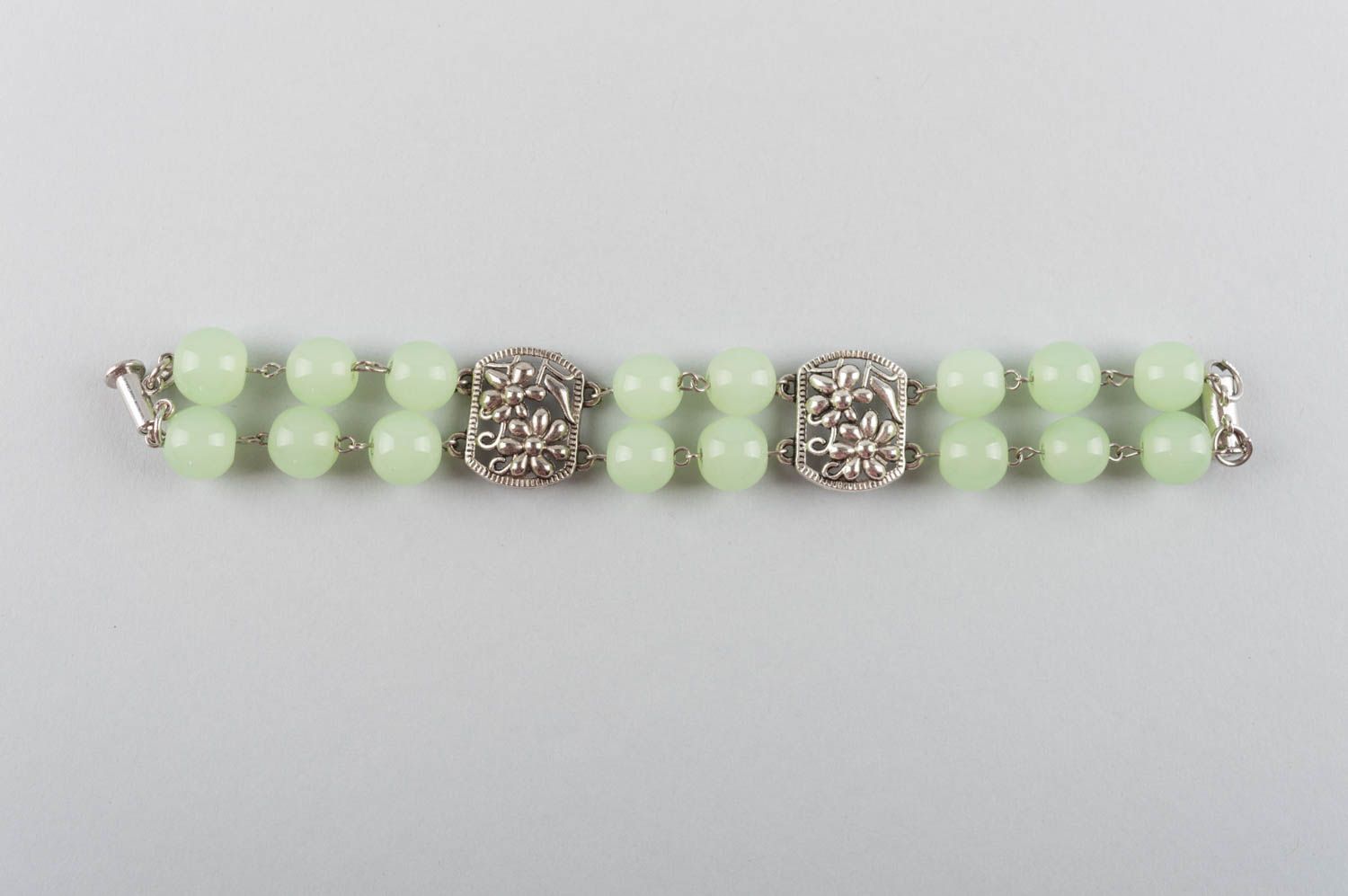 Beautiful gentle green handmade metal bracelet with natural nephrite stones photo 2