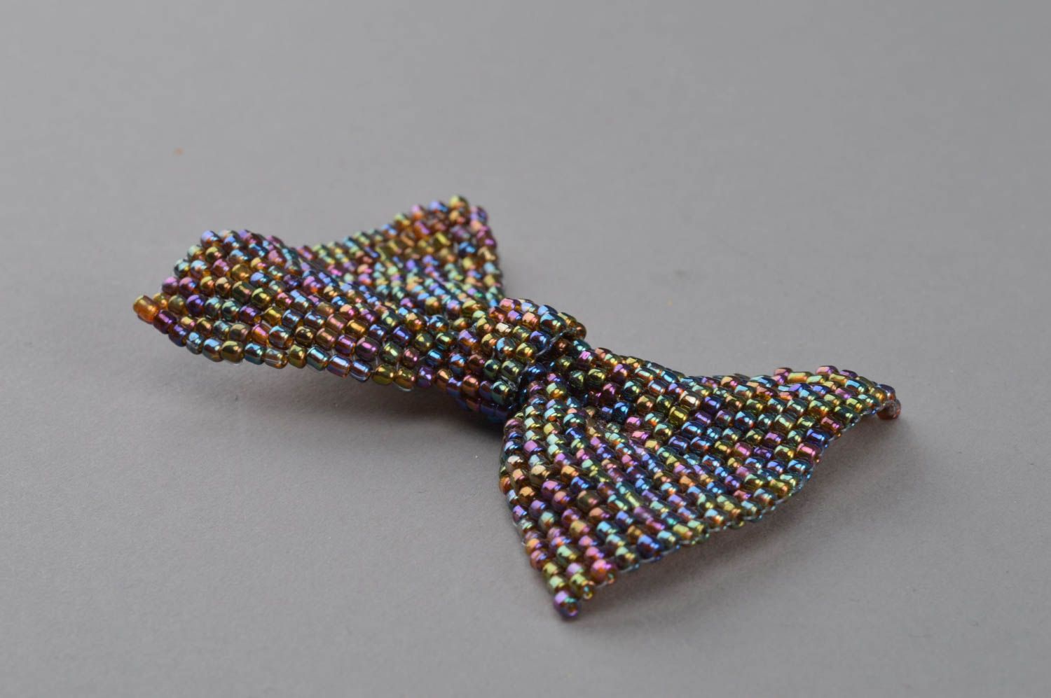 Fancy stylish handmade multicolor beaded brooch in the form of a bow photo 3