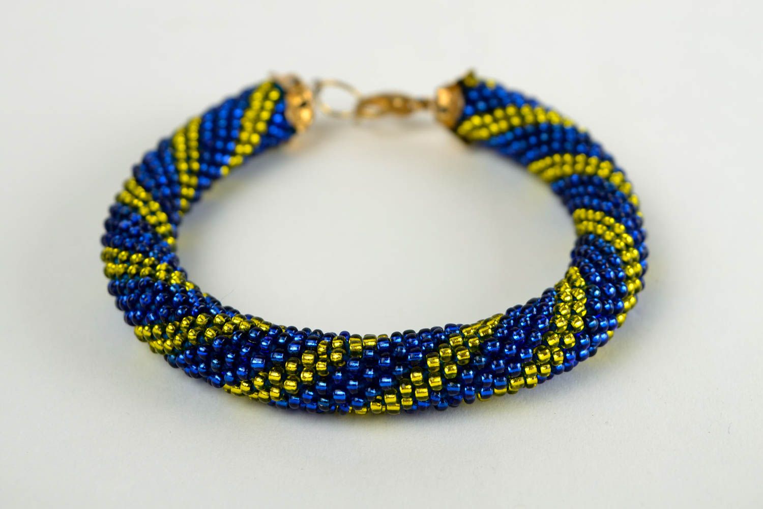 Beaded cord bracelet in dark blue and yellow beads for young girls photo 3