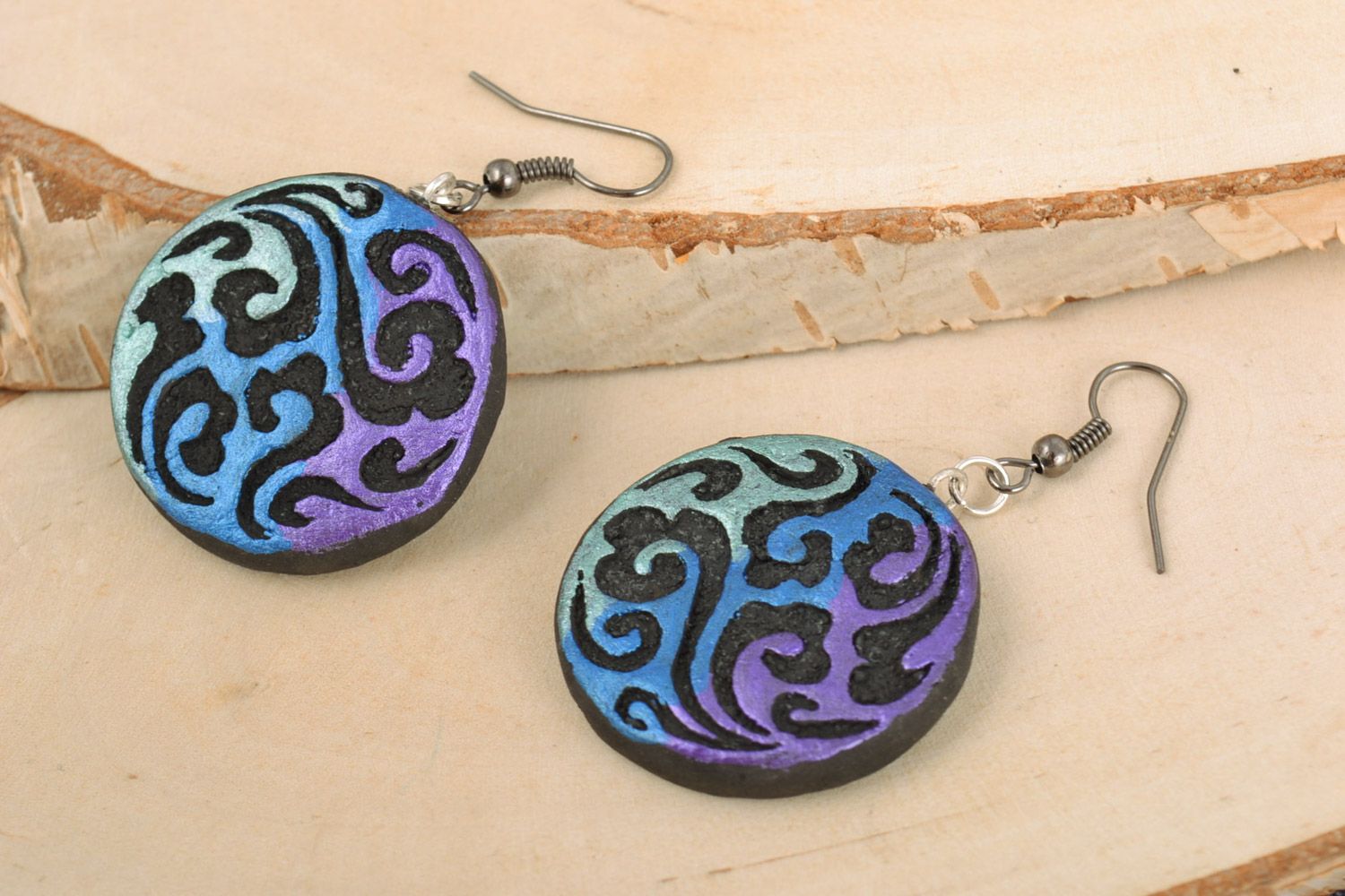 Dark handmade clay round earrings painted with acrylics photo 1