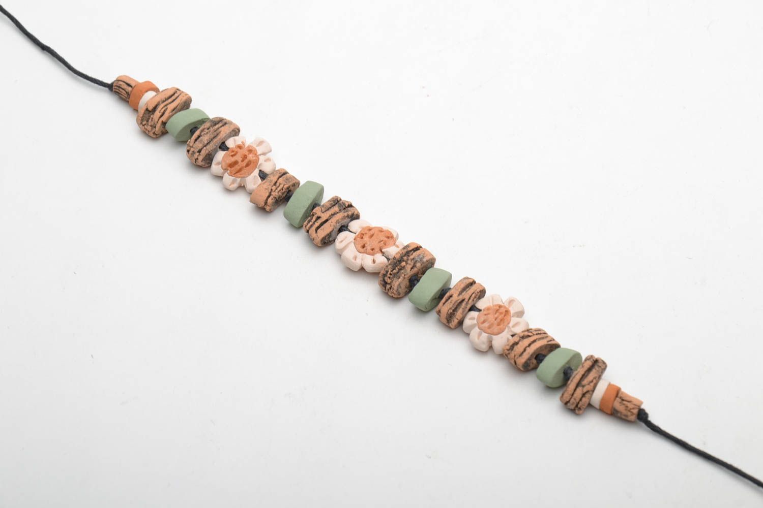Ceramic bracelet with waxed cord  photo 3