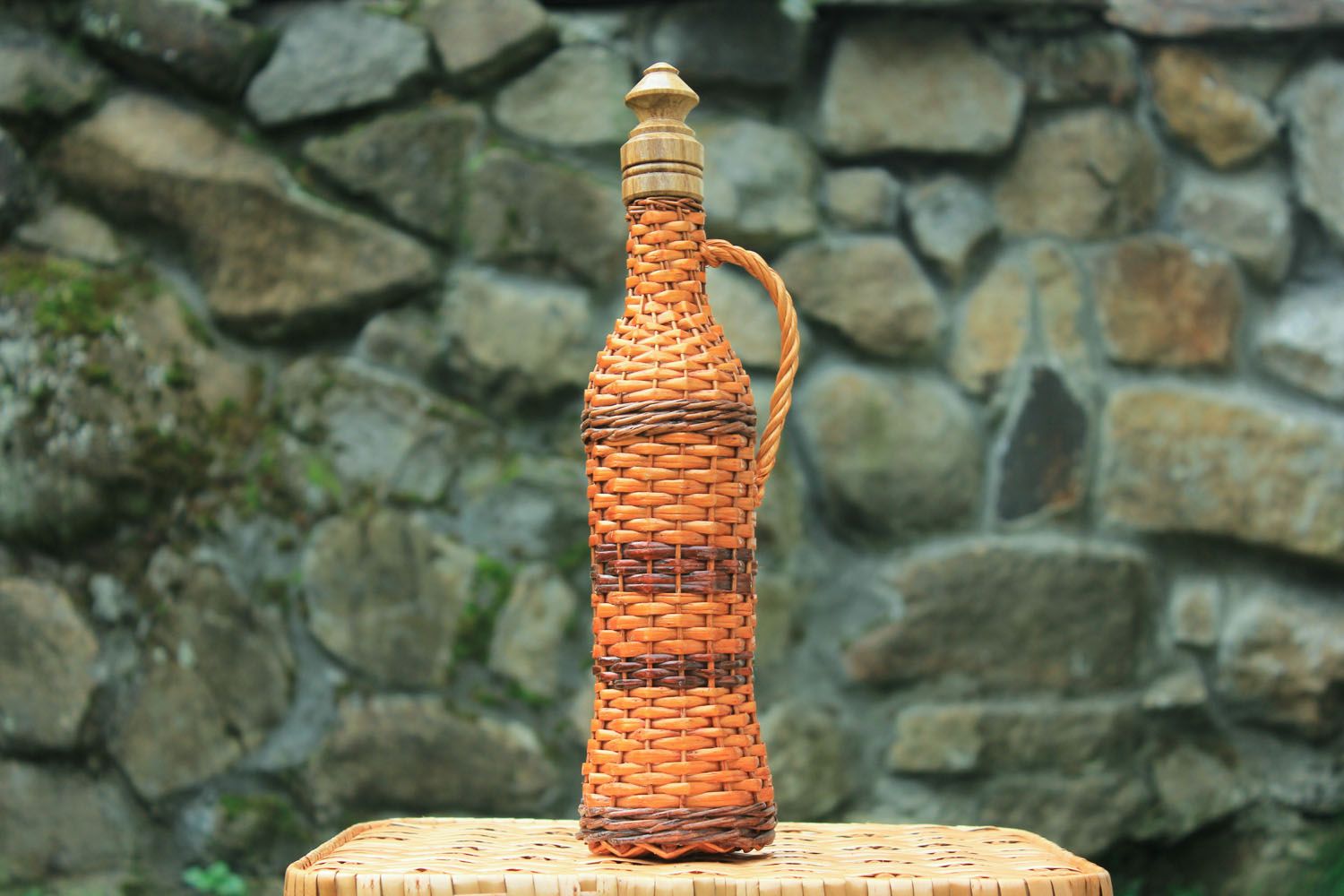 Decorative bottle with a handle photo 1