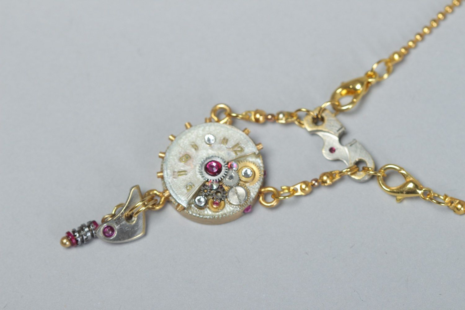 Women's handmade metal neck pendant with clockwork details in steampunk style photo 2