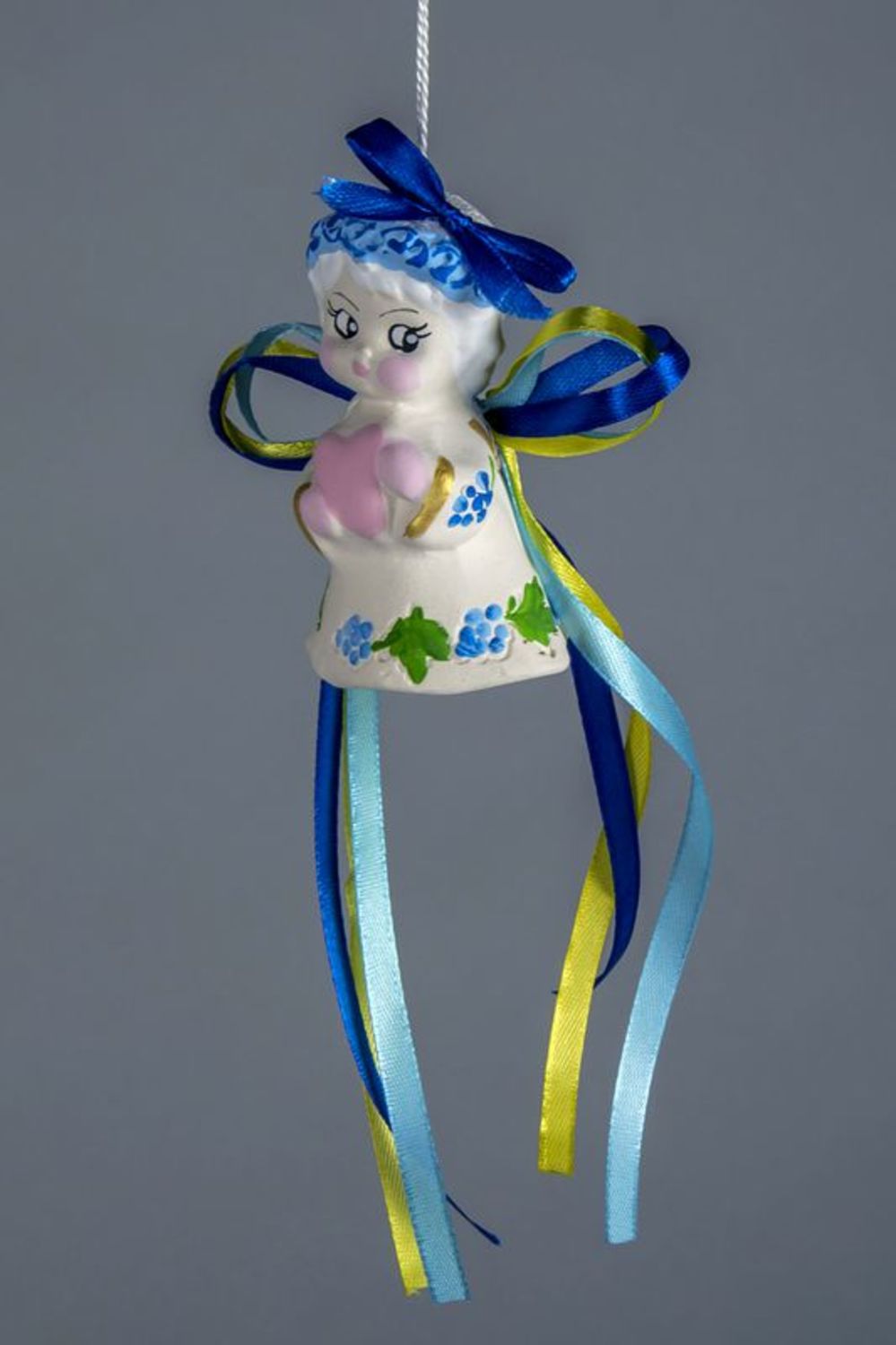 Ceramic bell with blue ribbons photo 1