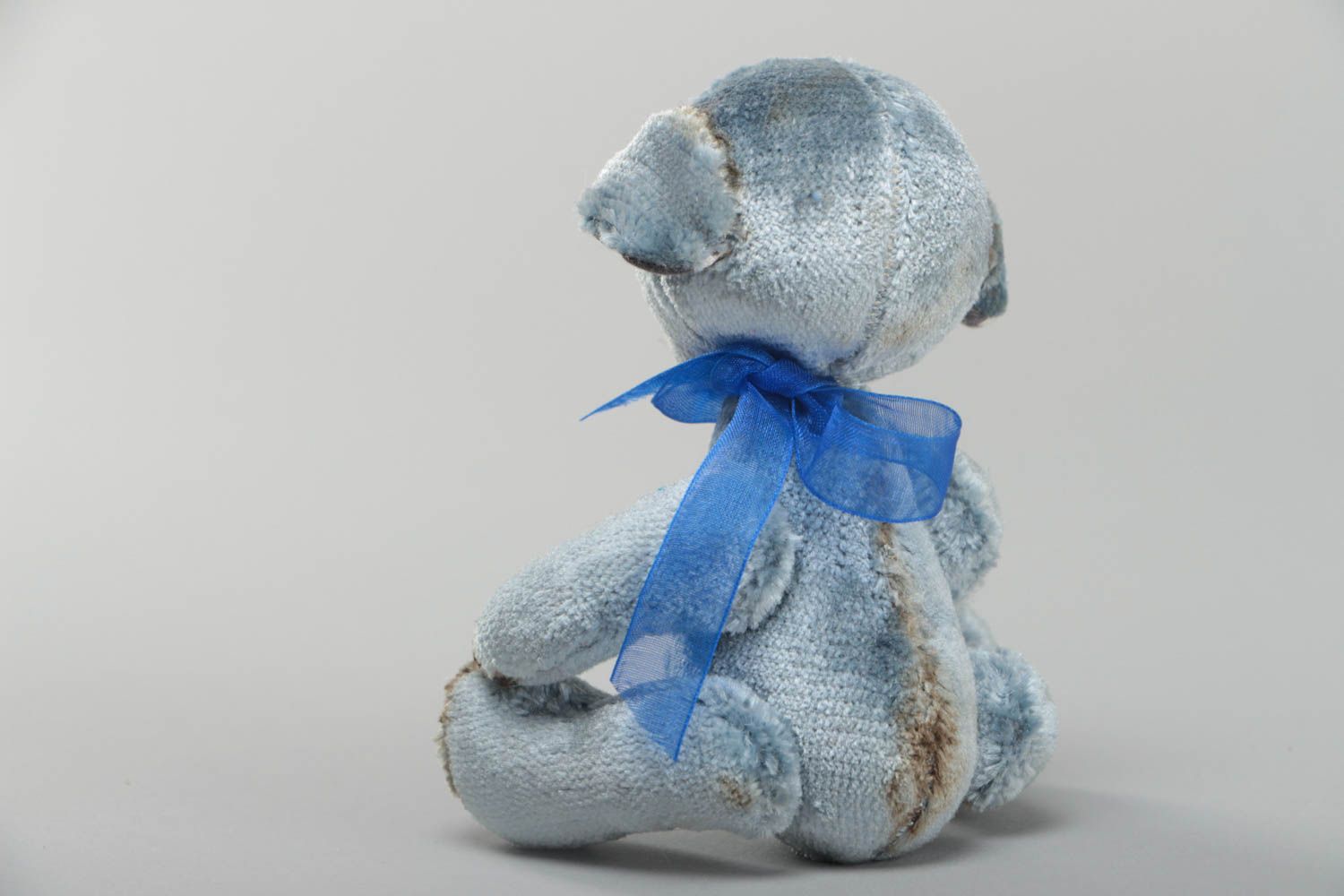 Handmade decorative gray toy bear with small bow interior decor element photo 4