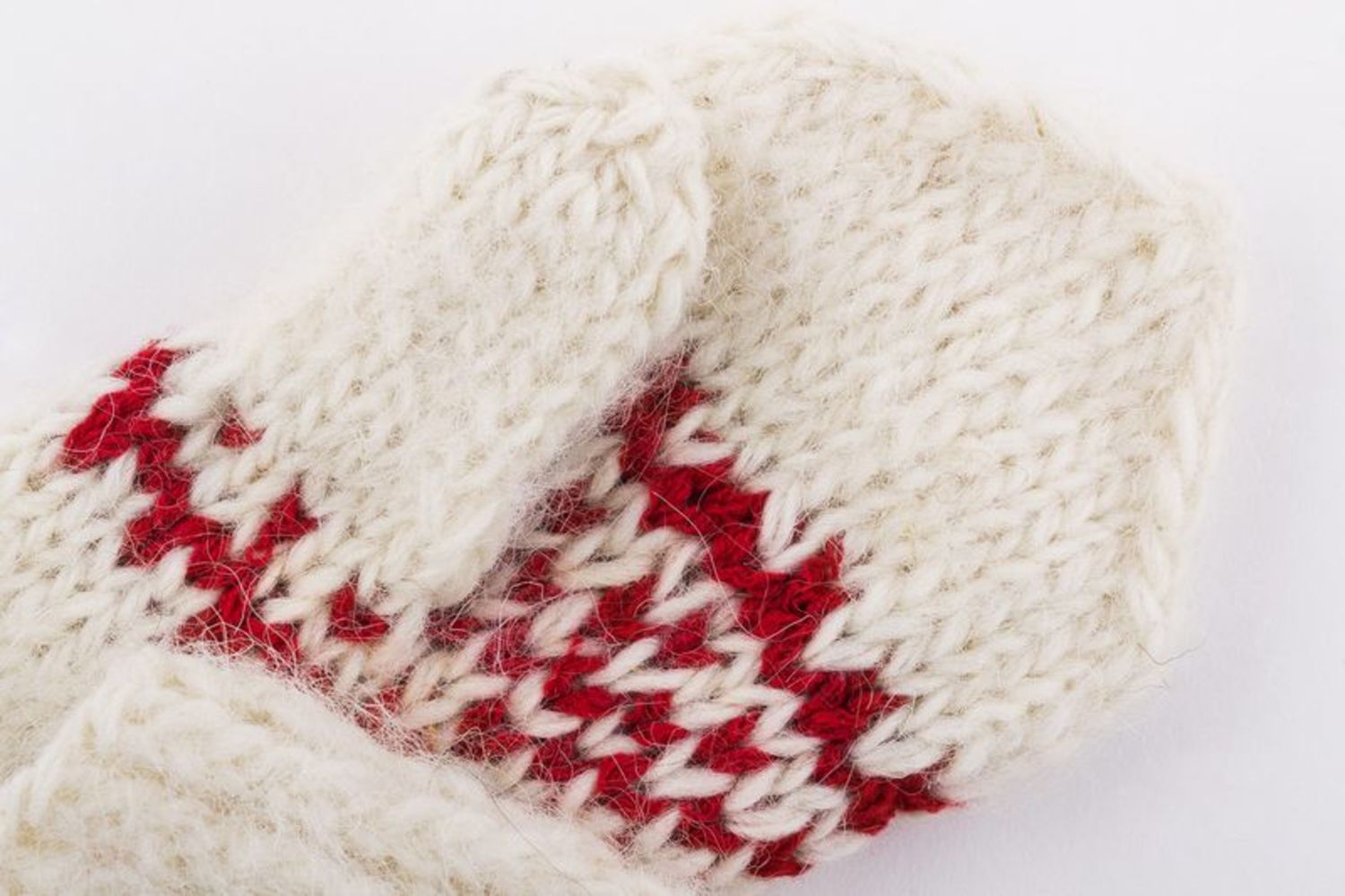White woolen mittens with red ornament photo 3