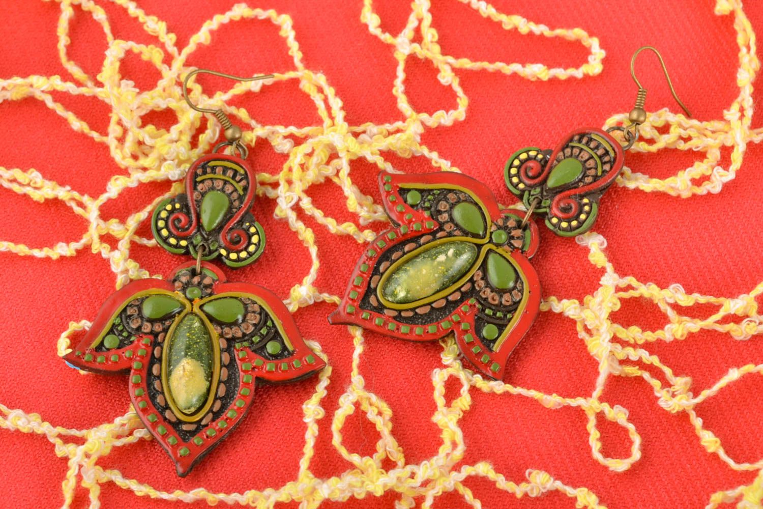 Green plastic dangle earrings in Indian style photo 1