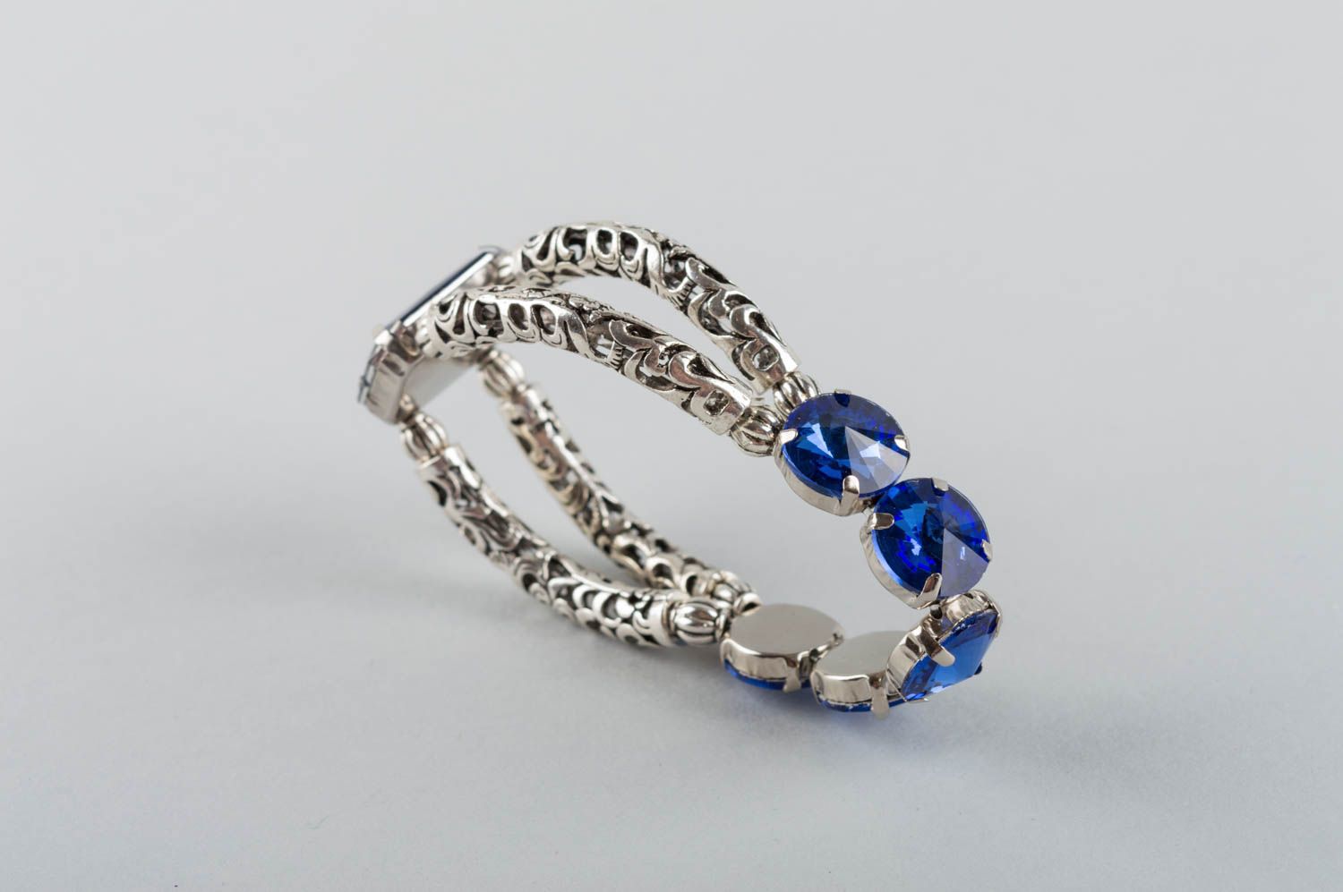 Women's handmade designer metal wrist bracelet with large blue strasses photo 5
