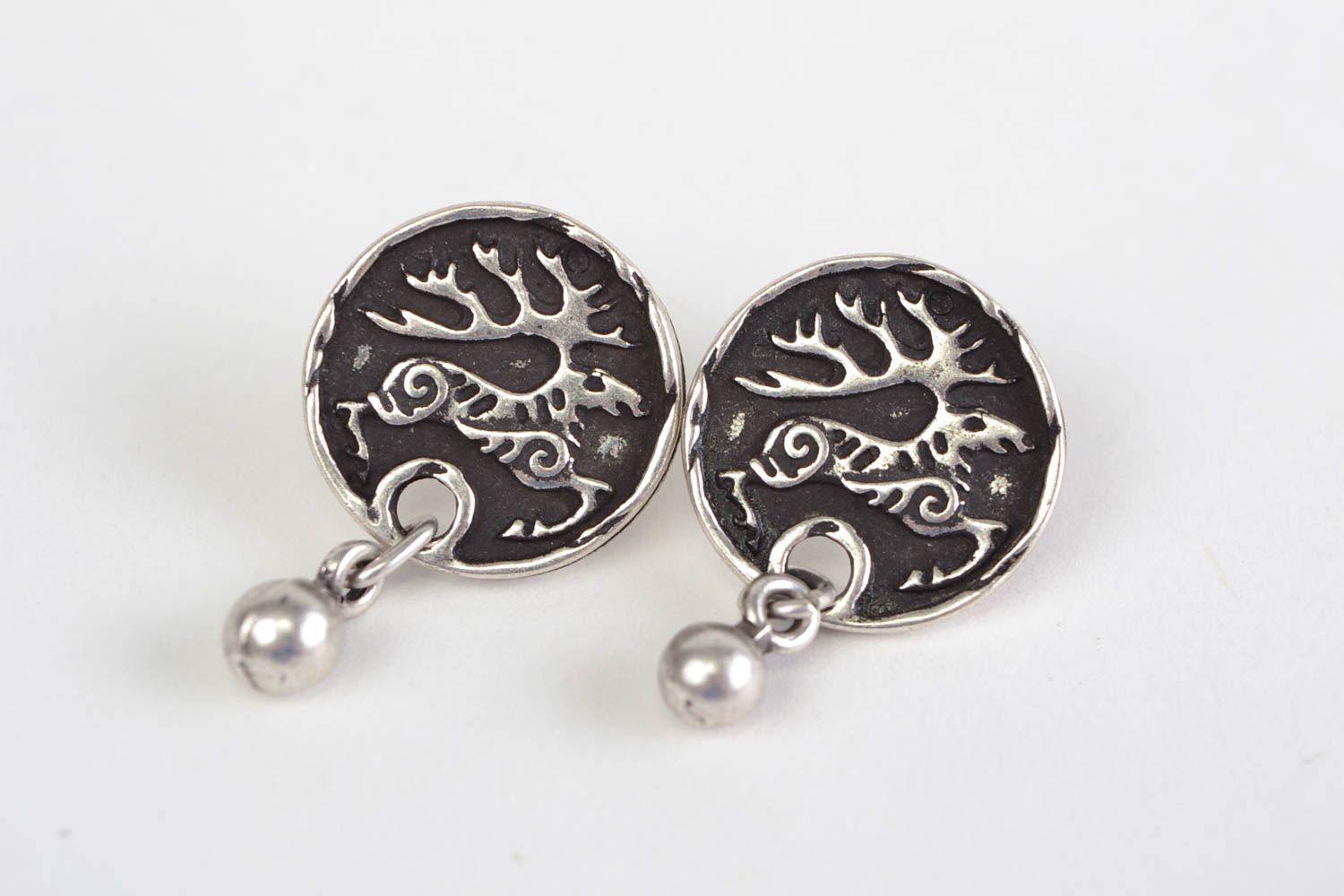 Handmade small round stud earrings cast of hypoallergenic metal with deer image photo 2