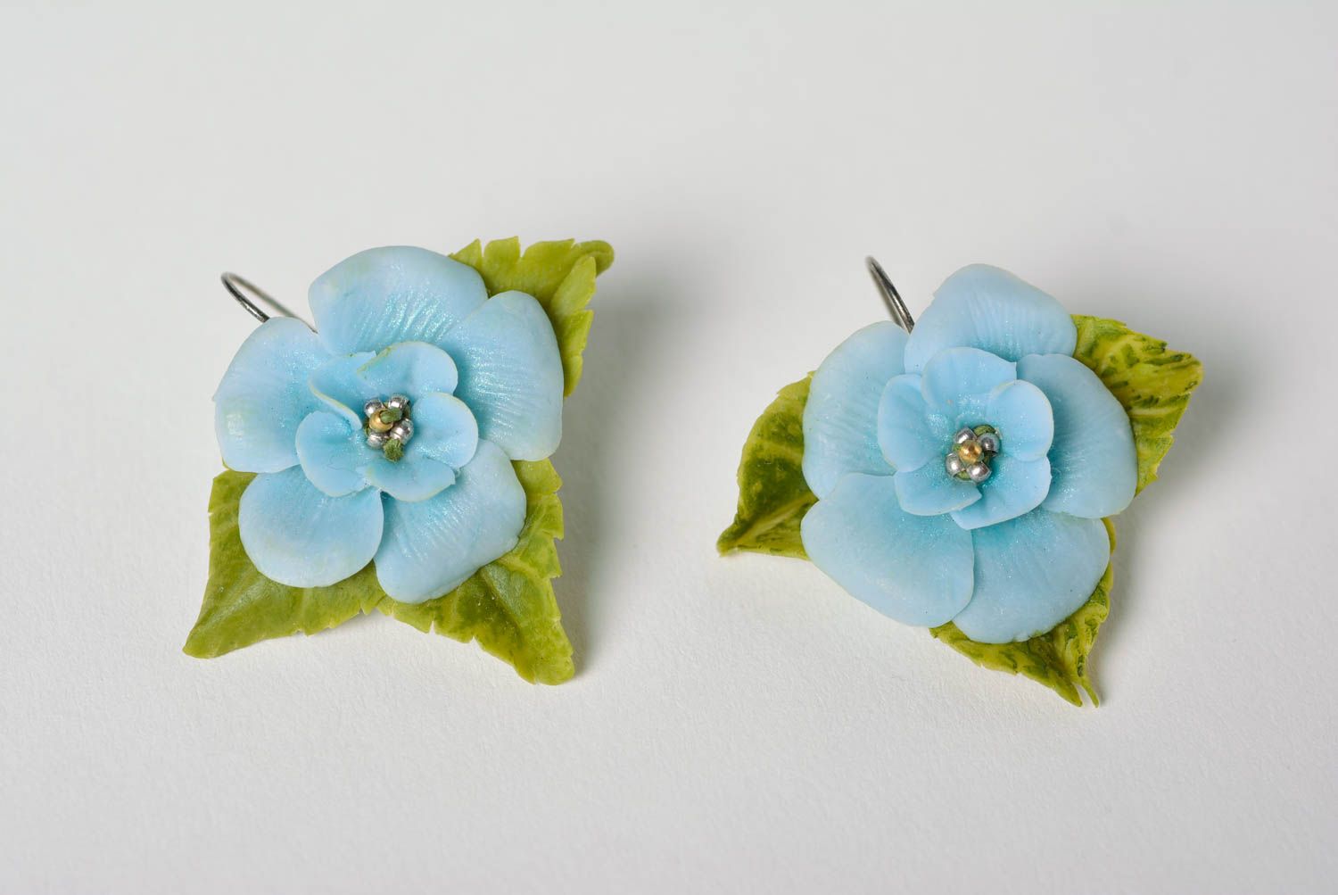 Handmade designer dangling earrings with tender blue polymer clay flowers  photo 2