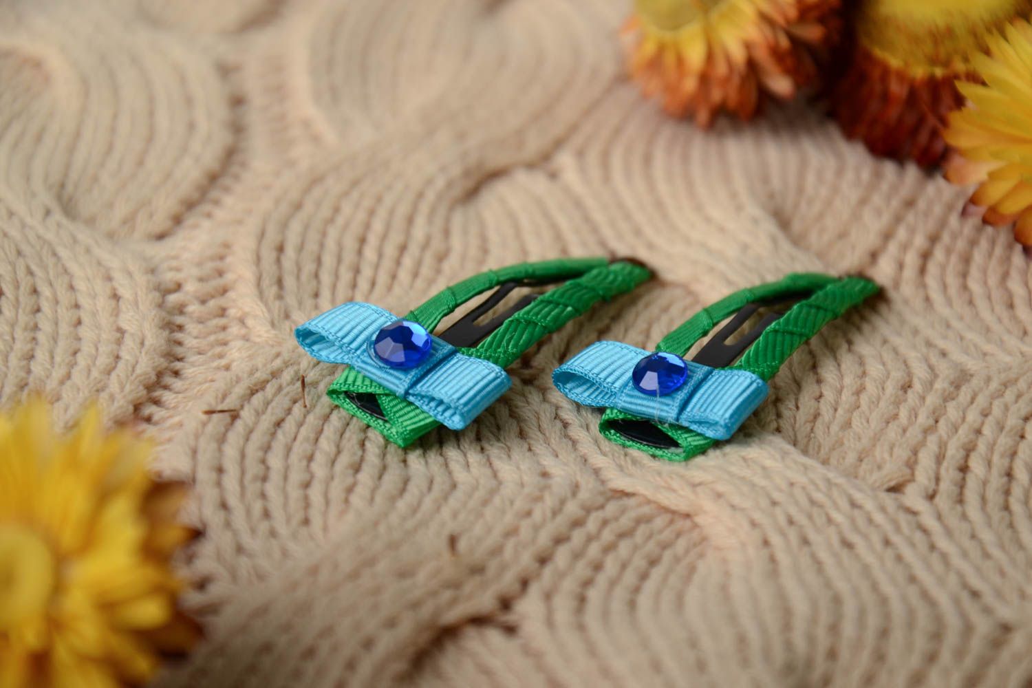 Small handmade green hair clips made of rep ribbons and metal present for child photo 1