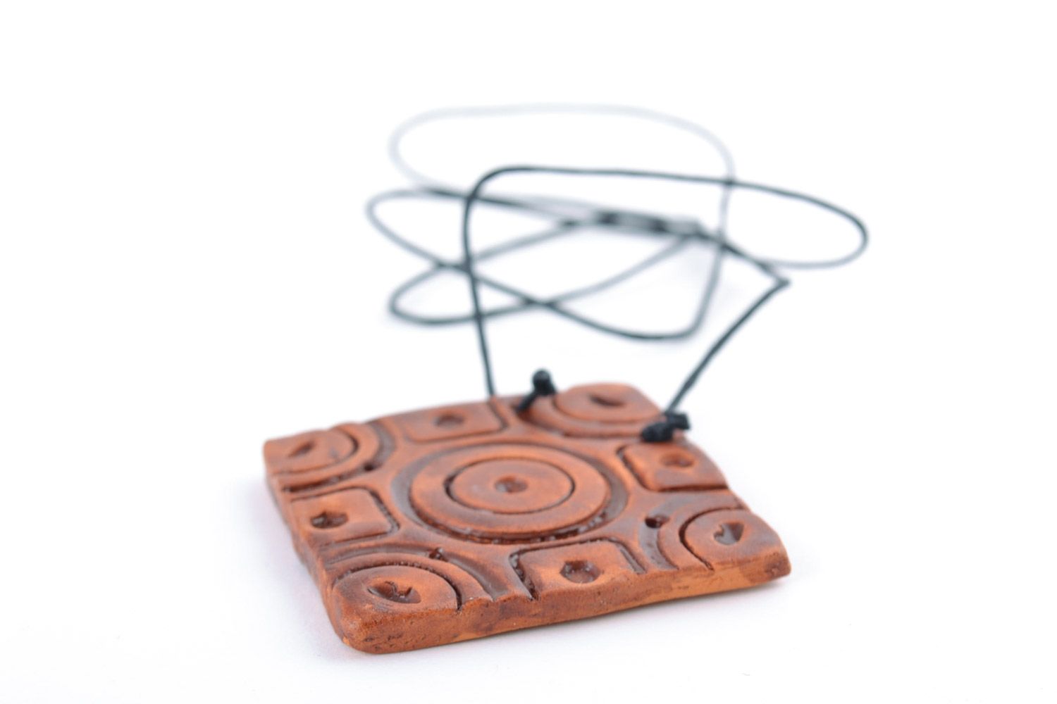 Handmade ceramic neck pendant of square shape with ornament in ethnic style photo 5