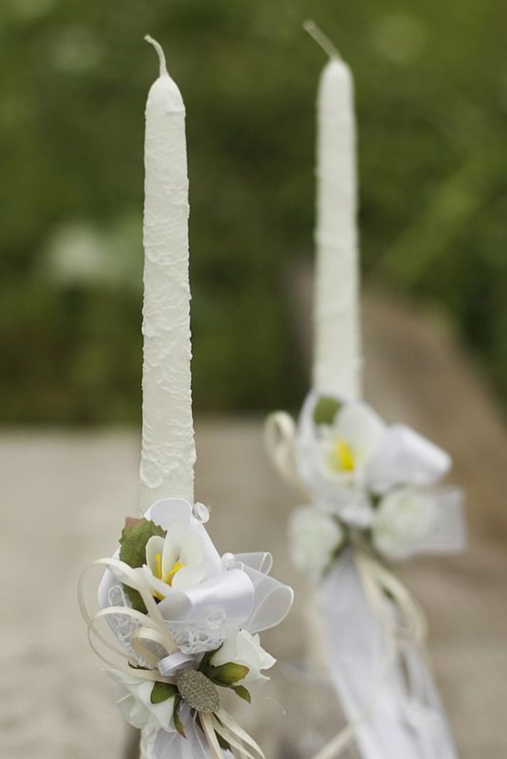 Wedding candle with white ribbons photo 4