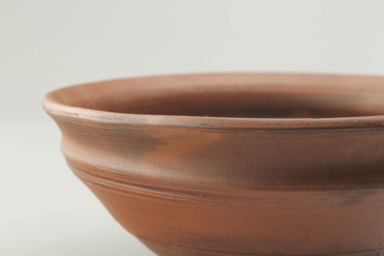 Bowl made of clay photo 2