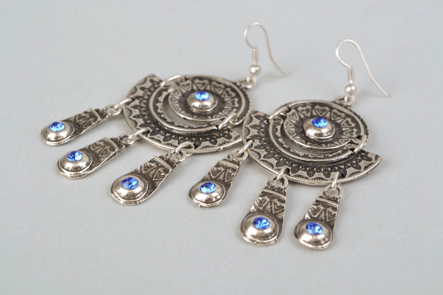 Beautiful unusual netal earrings in ethnic style photo 4