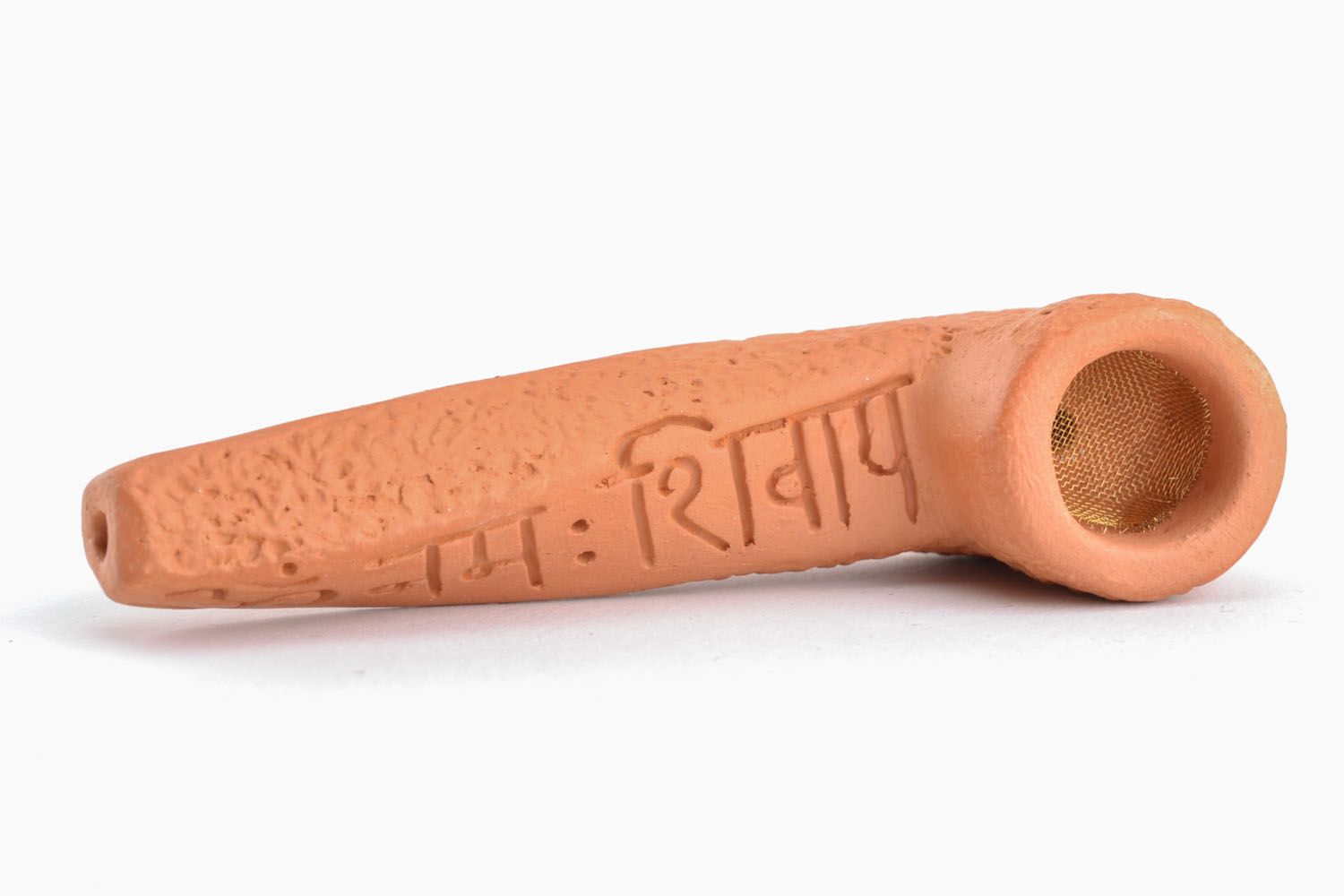 Red clay smoking pipe photo 1