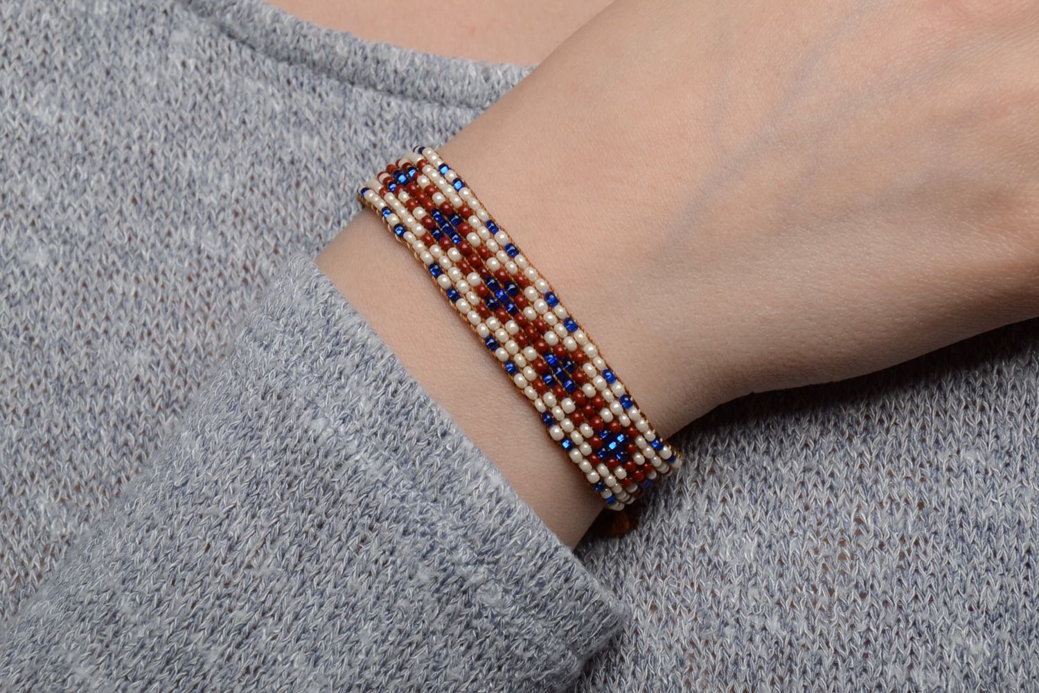 Beautiful handmade wide beaded bracelet with ethnic pattern photo 1