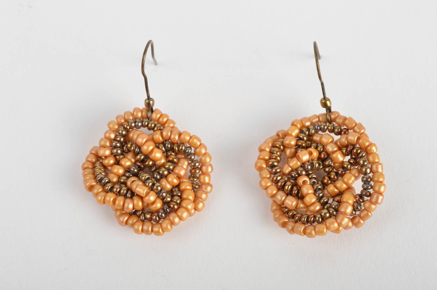 Handmade designer bead woven dangle earrings of sand color palette photo 2
