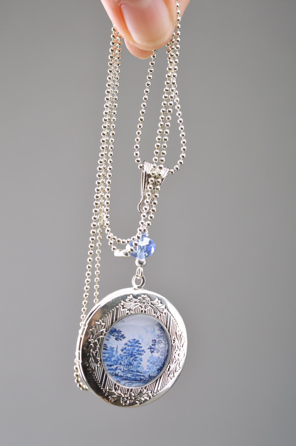 Handmade metal pendant with a print and lampwork author's work photo 3