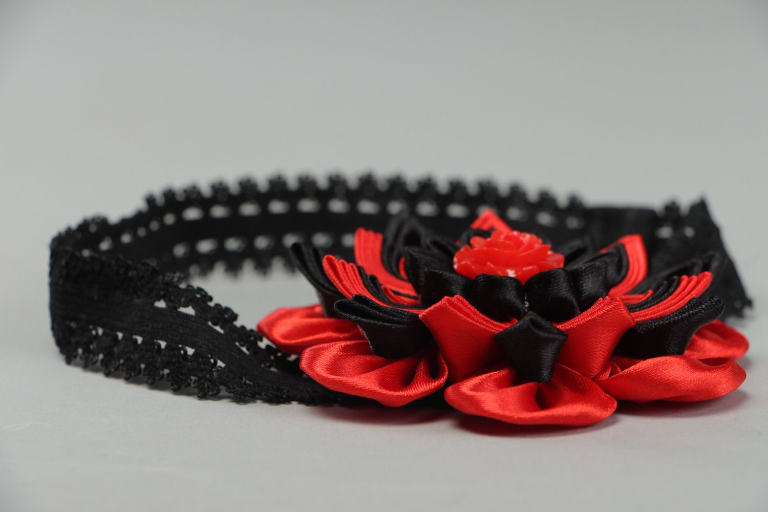 Stylish handmade elastic headband decorated with black and red kanzashi flower photo 2