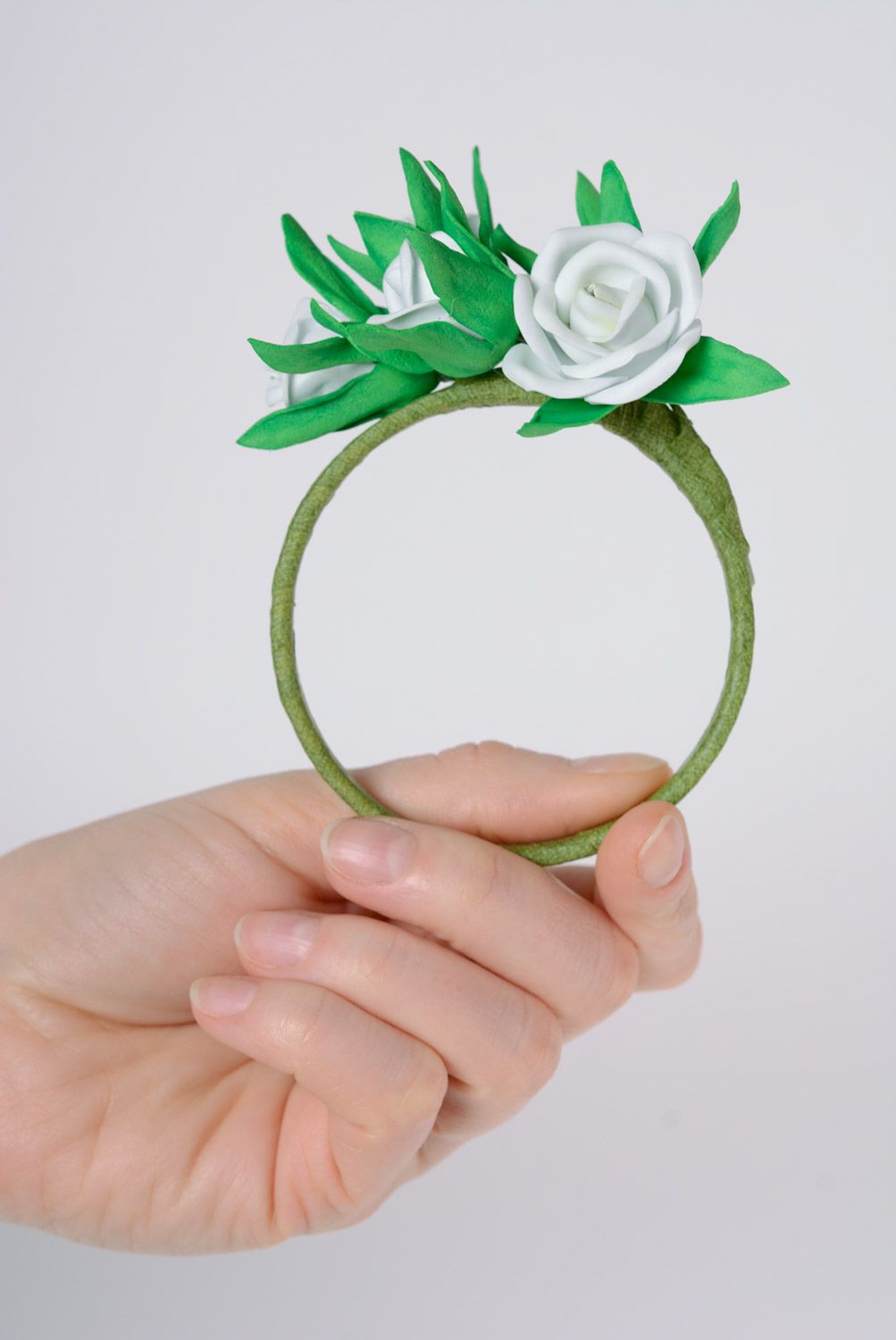 Handmade gentle foamiran fabric wrist bracelet with white flowers on green basis photo 3