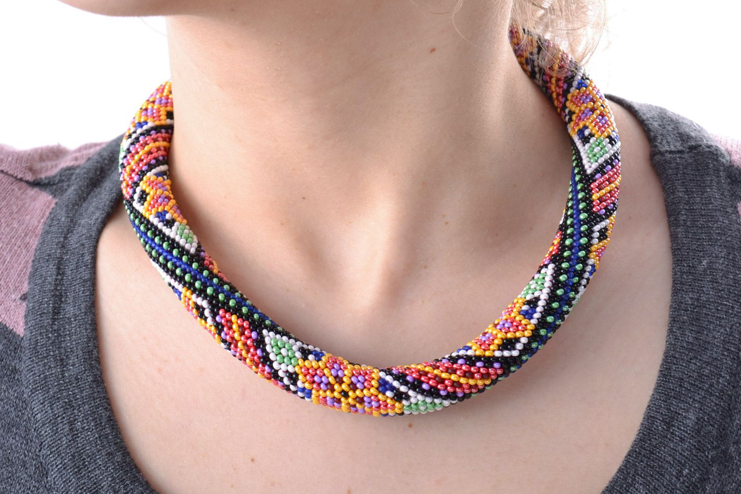 Handmade colorful women's cord necklace woven of beads with geometric ornament photo 1