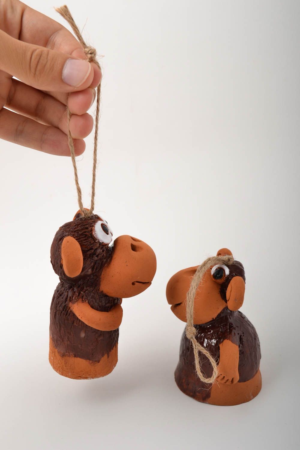 Campanelli d'autore in ceramica fatti a mano a forma di scimmie divertenti
 foto 4