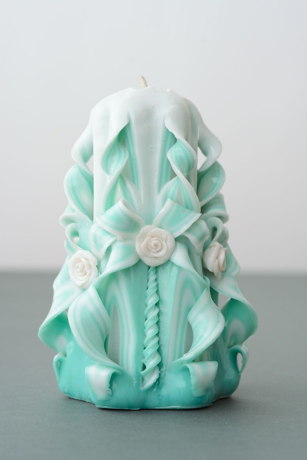 Carved candle of mint color photo 5
