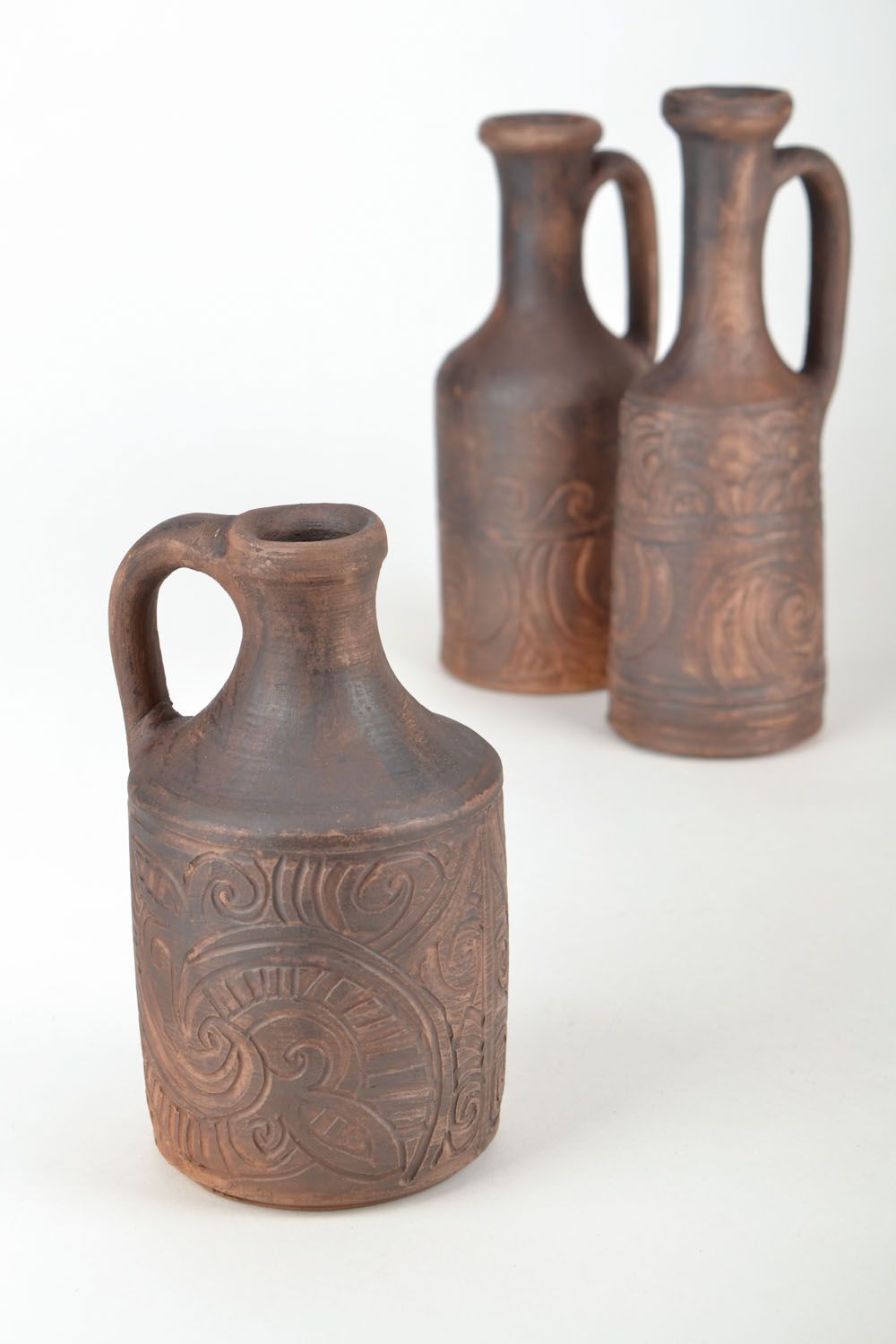 Ceramic bottle with handle photo 1
