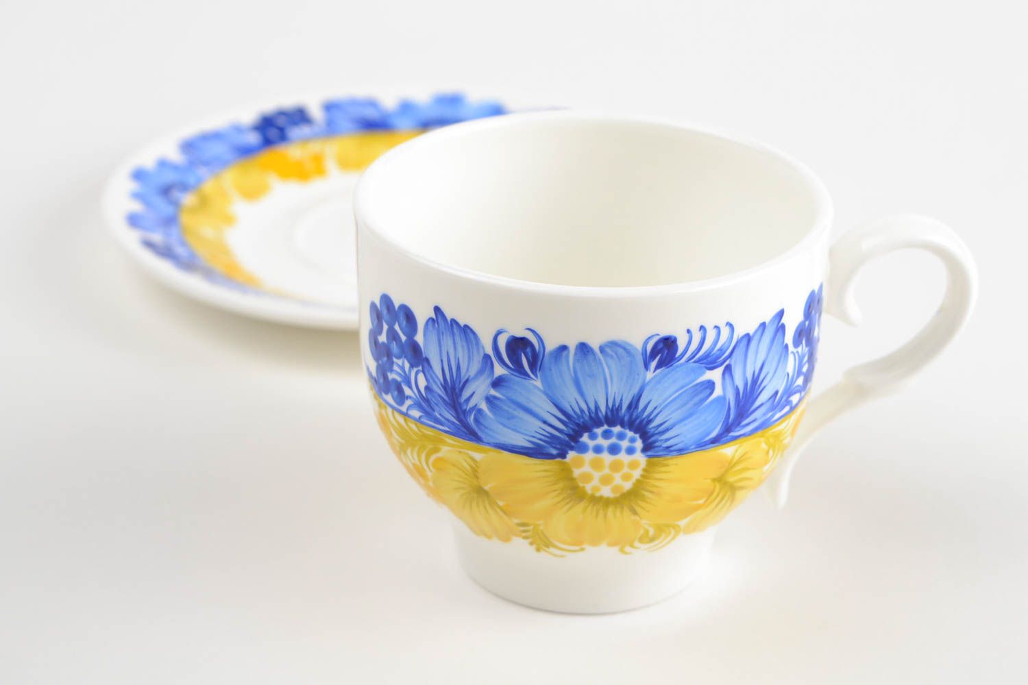 Elegant porcelain teacup in Ukrainian flag colors - yellow and blue photo 3
