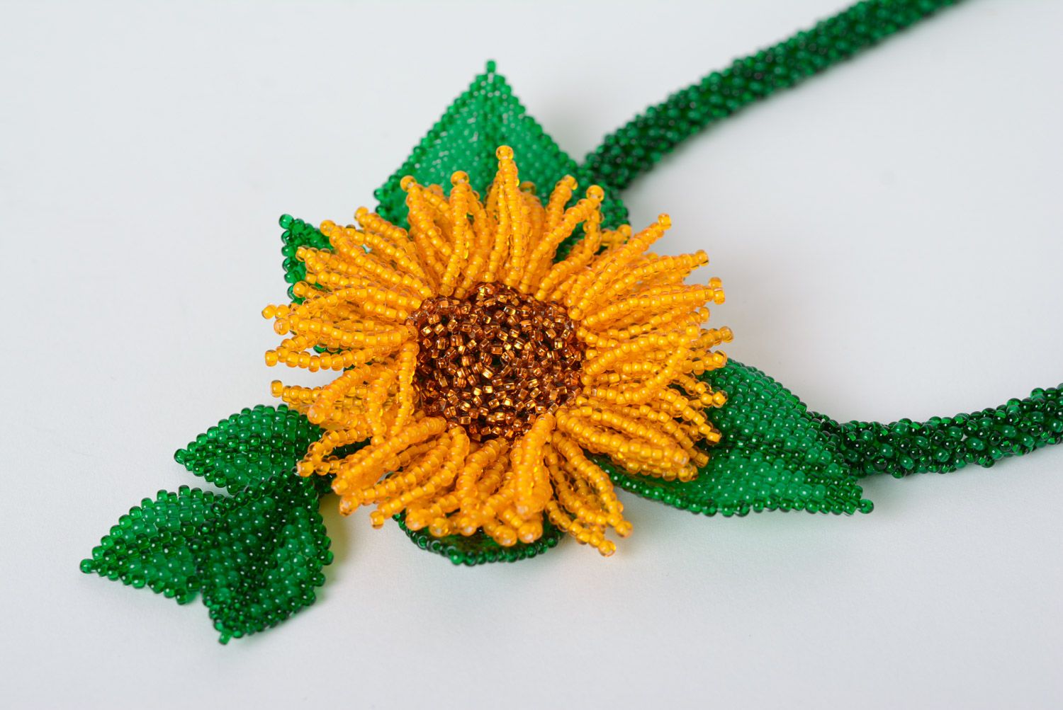 Handmade long beautiful necklace woven of beads in the shape of sunflower photo 3