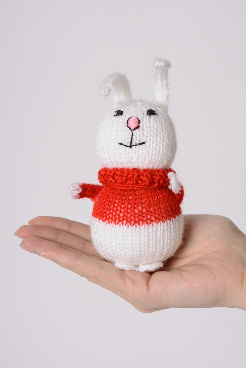 Small handmade knitted soft toy white hare in red sweater photo 4
