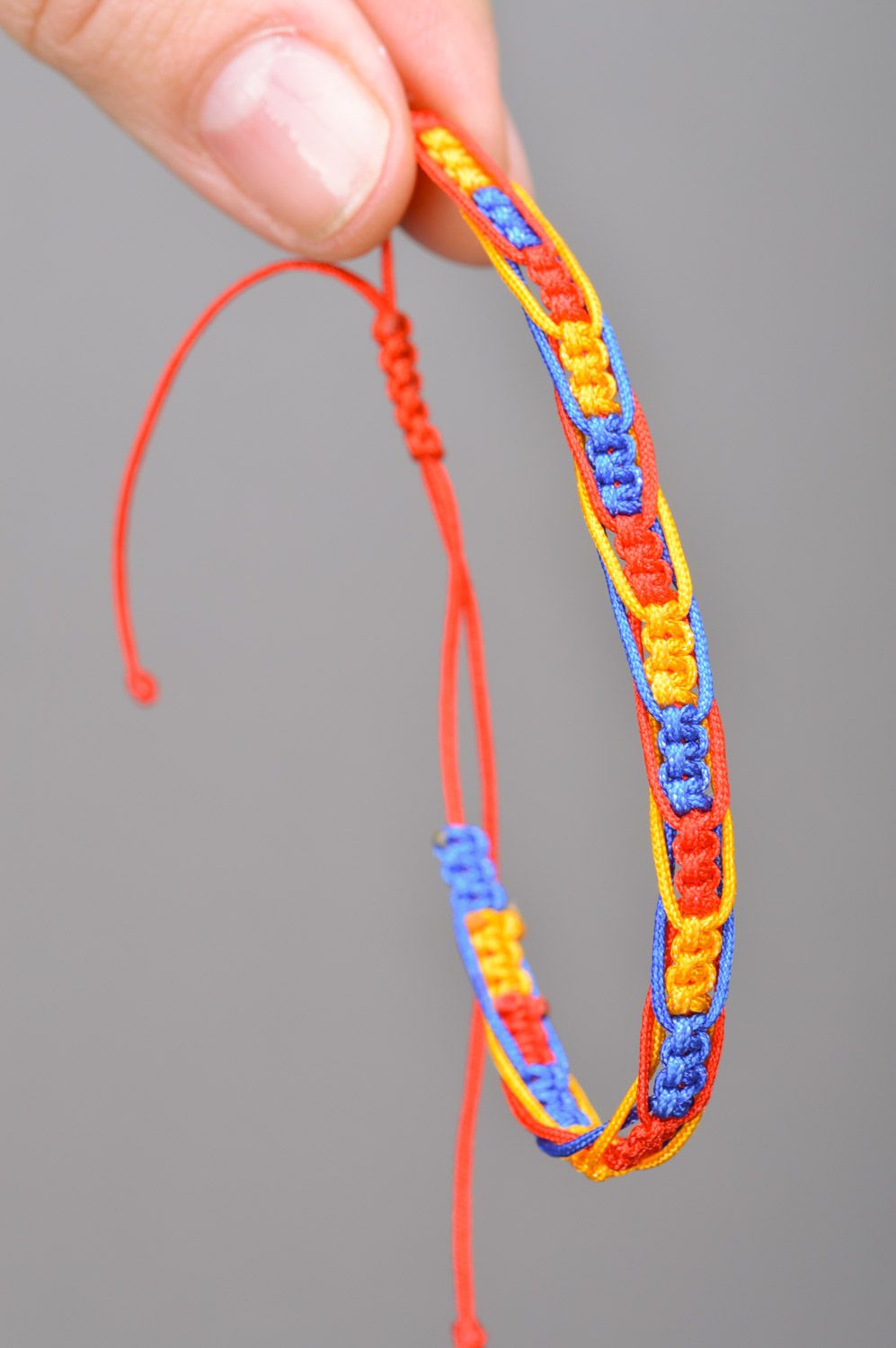Handmade multi-colored textile bracelet woven of threads for women photo 3
