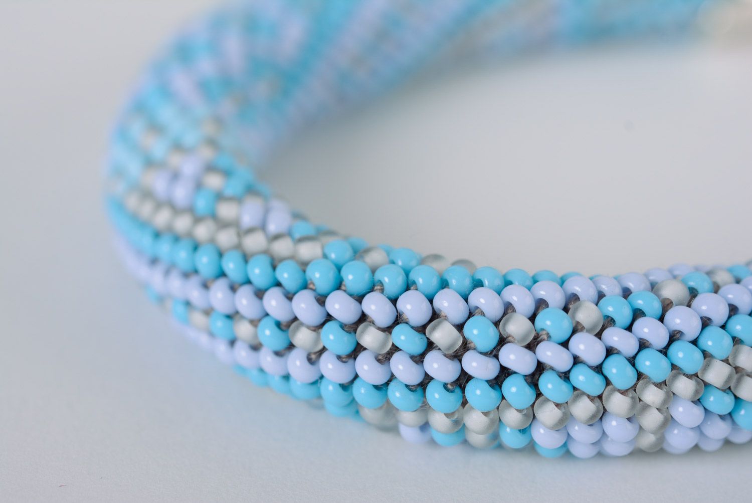 Blue handmade woven beaded cord bracelet with chain and pearl-like beads photo 2