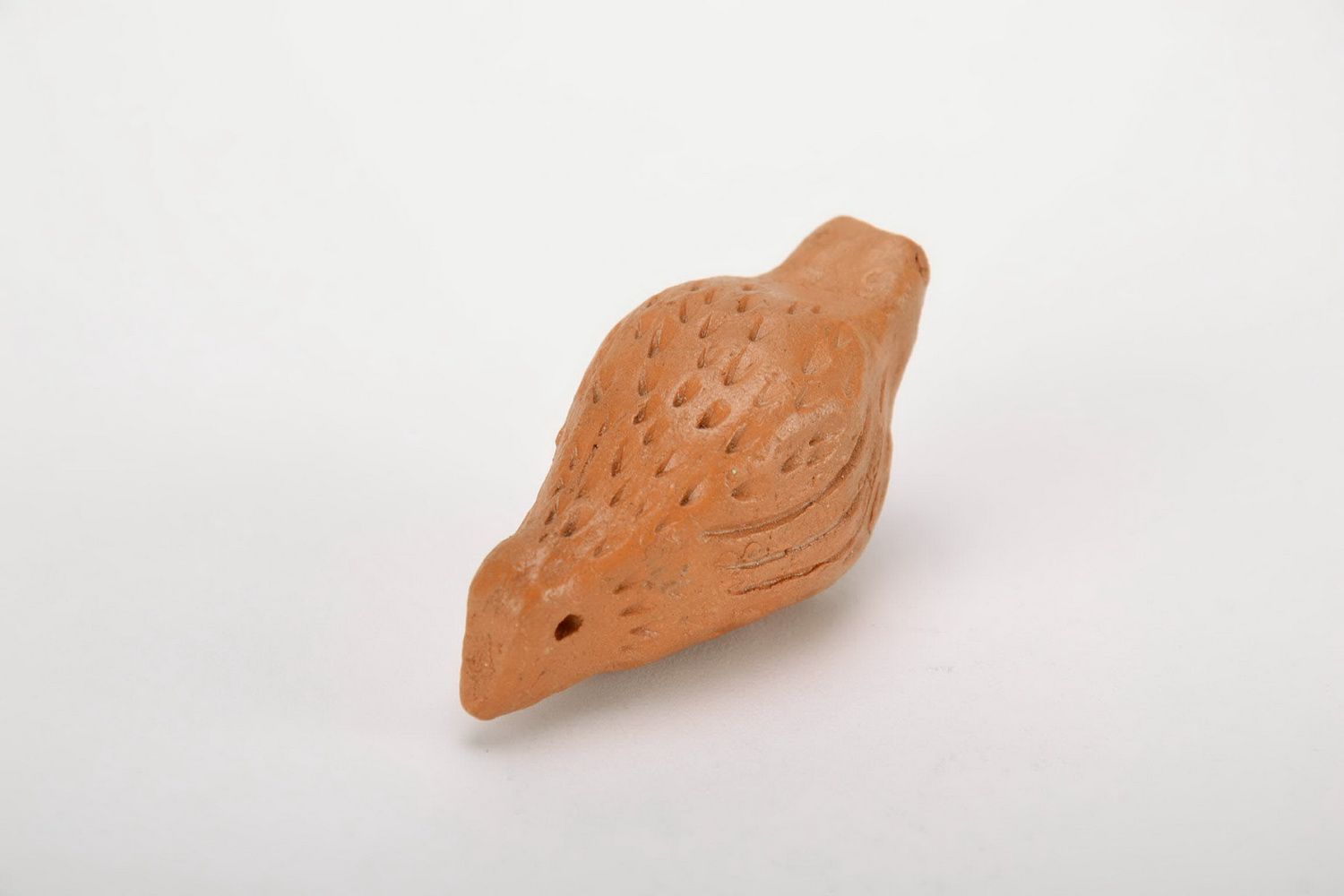 Clay penny whistle Nestling photo 3