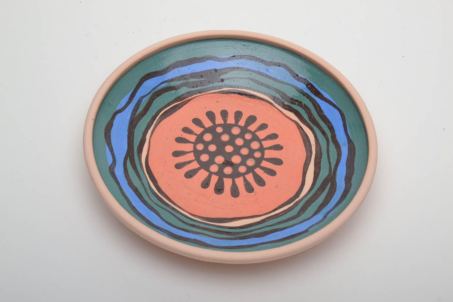 Pink ceramic plate painted with engobes and glaze photo 3