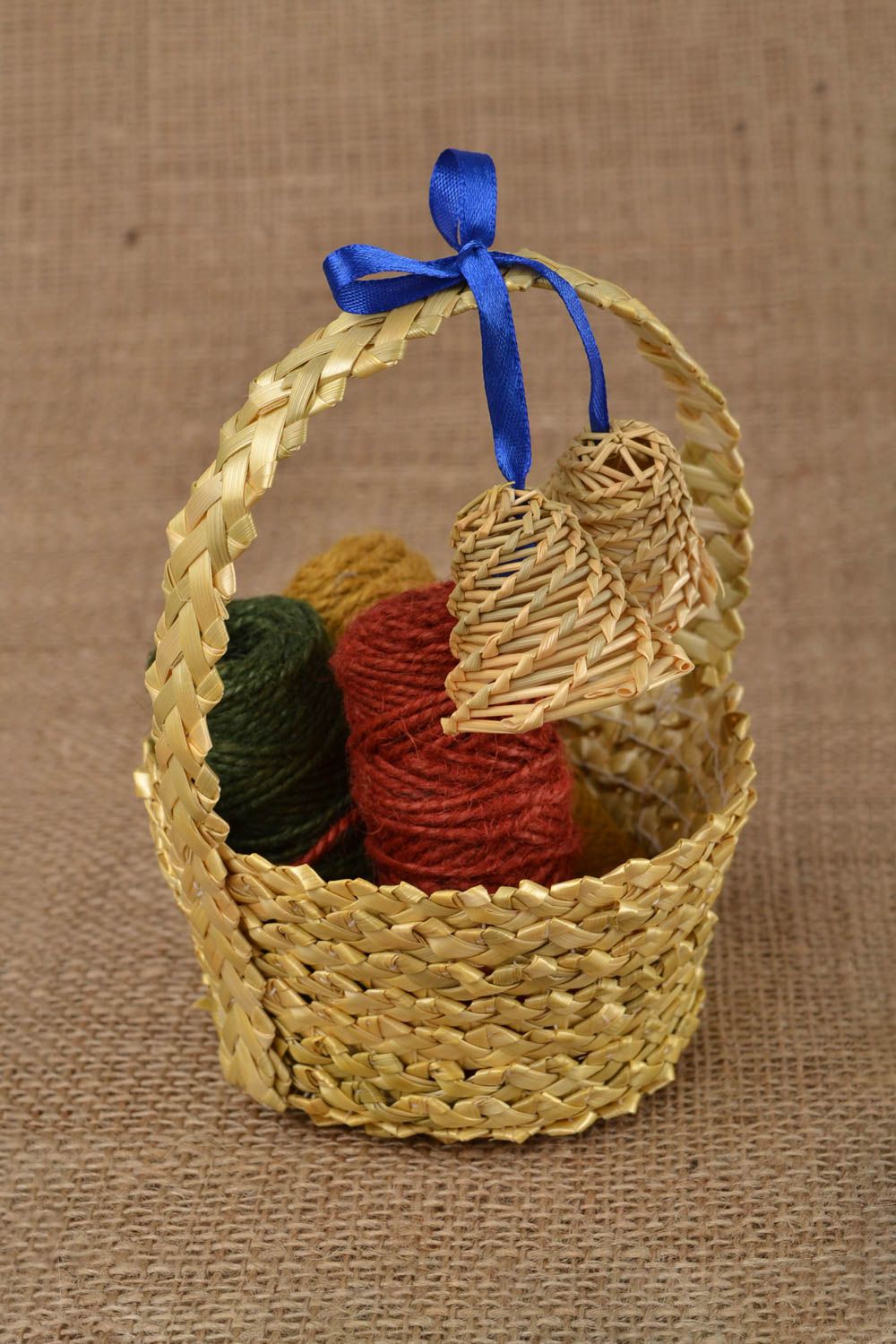 Beautiful small handmade decorative woven straw basket with bells photo 1