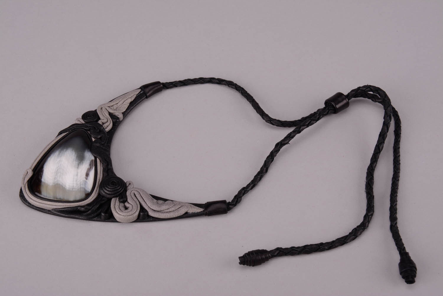 Necklace made of cow horn and leather photo 2