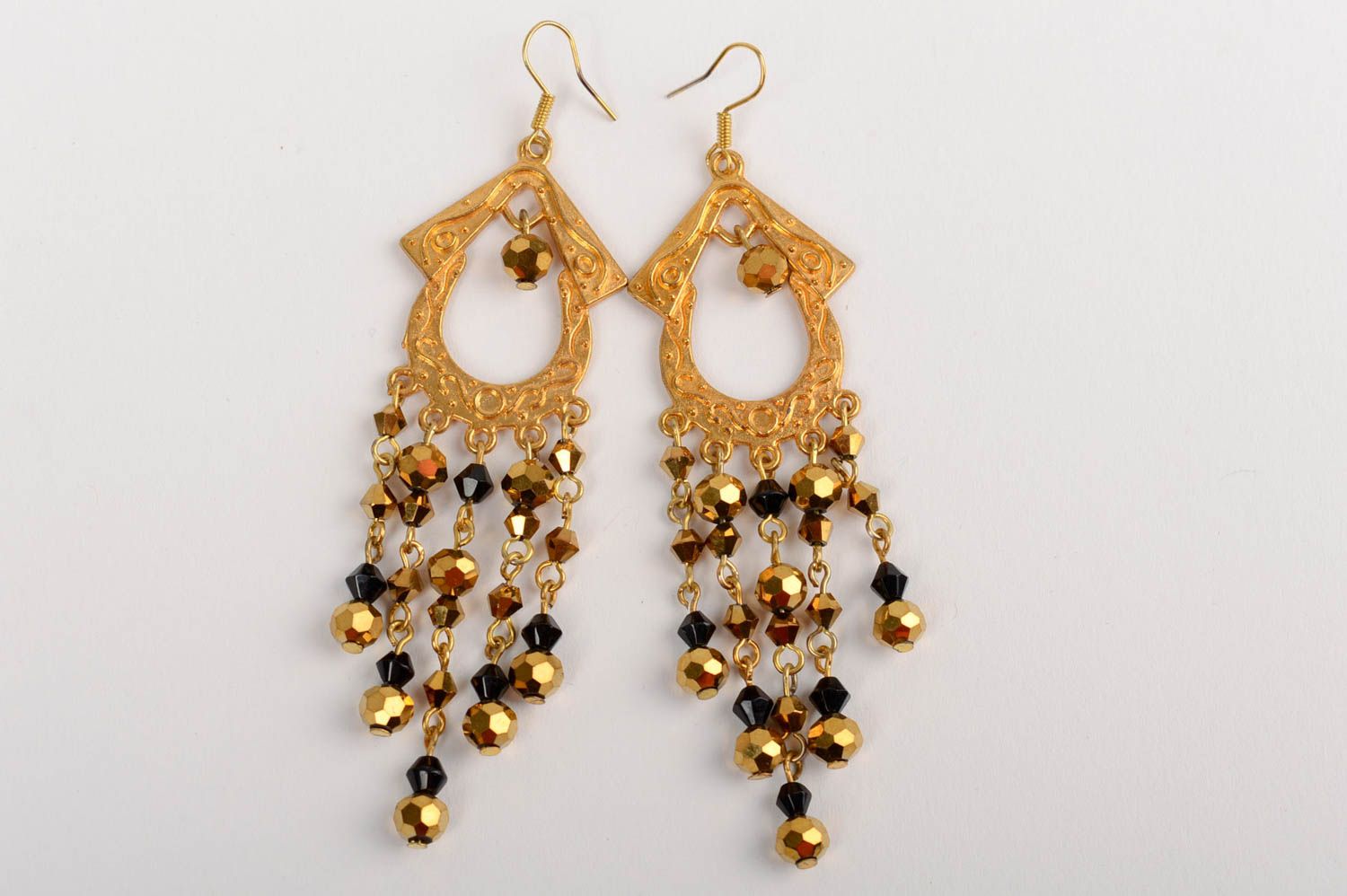Handmade long festive dangle earrings with crystal beads in golden color palette photo 2