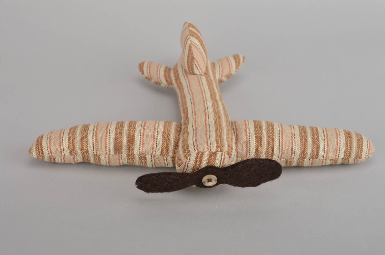 Beautiful designer unusual cute beige soft handmade toy in shape of plane photo 2